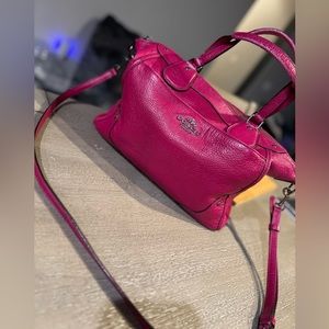 Pink/raspberry colored Authentic Coach Purse good condition. Mickie Satchel
